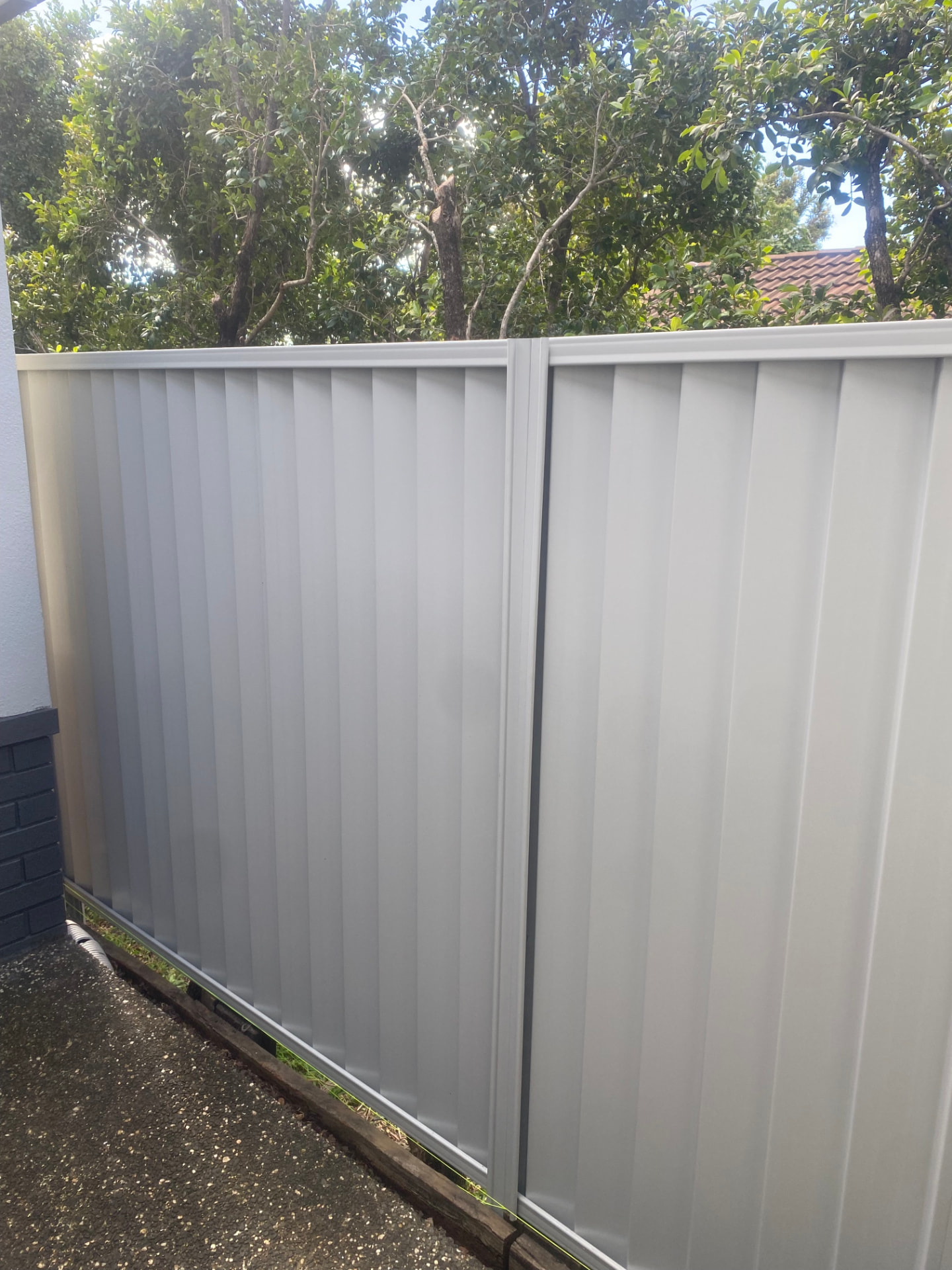 New Surfmist Colorbond fence installed at a Gold Coast home