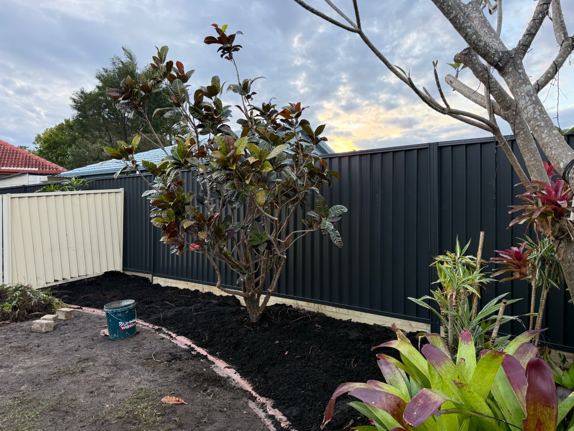 Monument Colorbond fence with landscaped garden